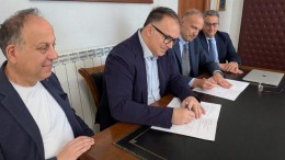 la firma di De Martinis